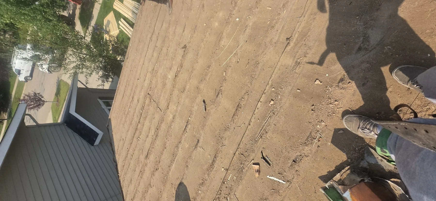 Roof deck work during a Strathcona Calgary replacement