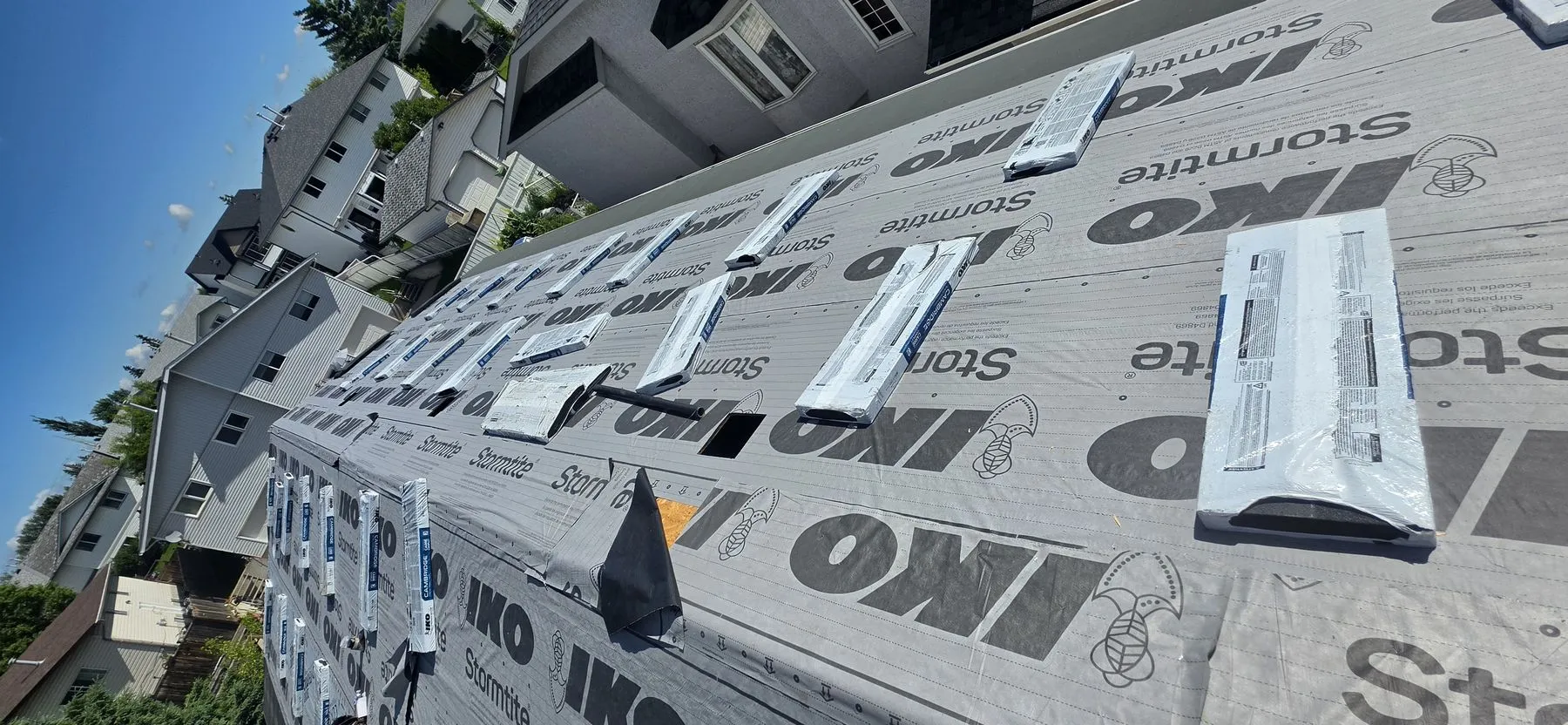 Roof system installation during a Strathmore replacement