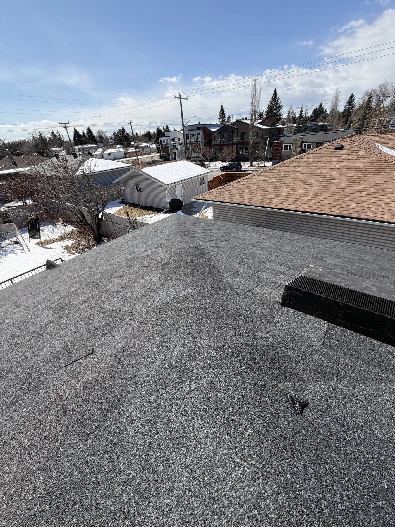 Completed roof after replacement in Spruce Cliff Calgary
