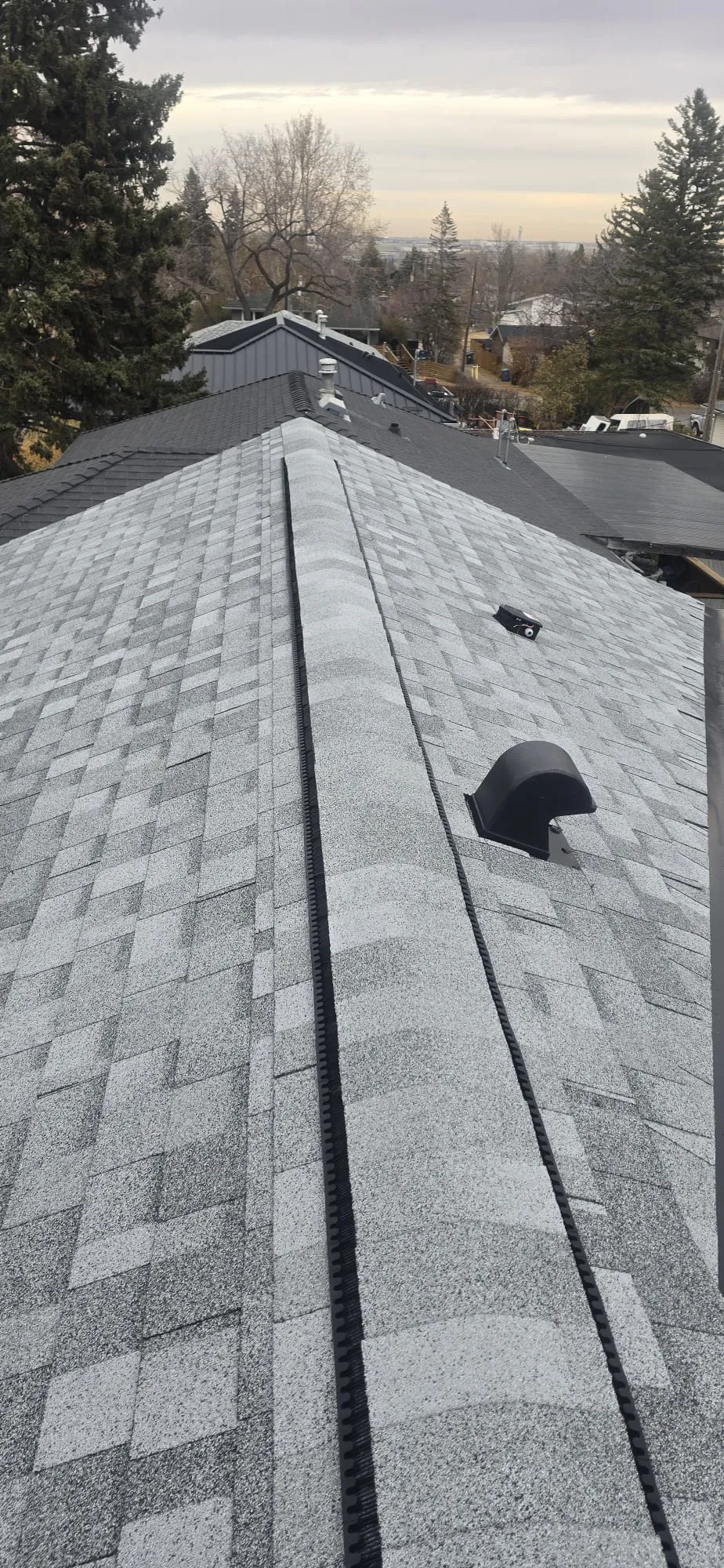 Attic ridge vent roof exhaust in Calgary