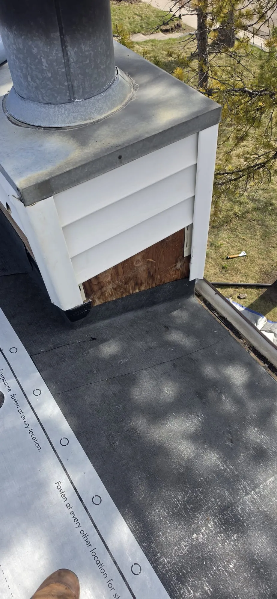 Chimney flashing flat roof membrane restoration