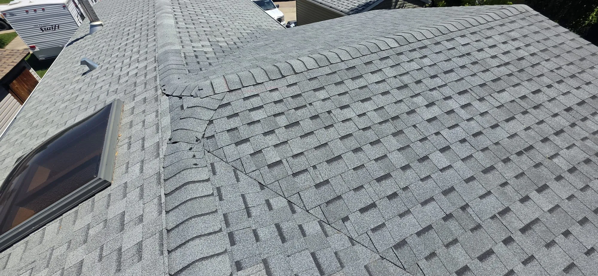 Curb mounted skylight installation shingle roof in Calgary