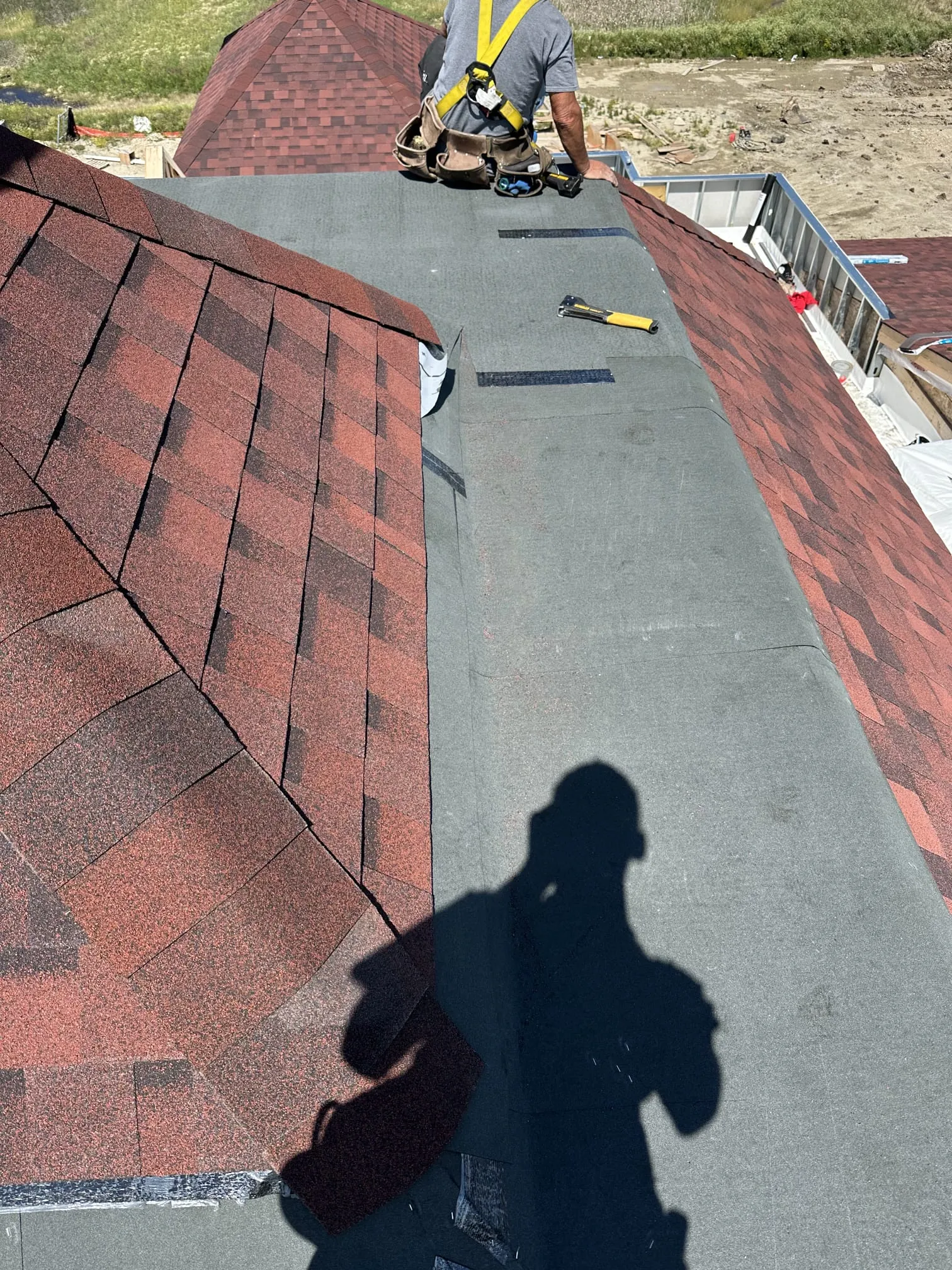 Flat roof membrane install roofer crew