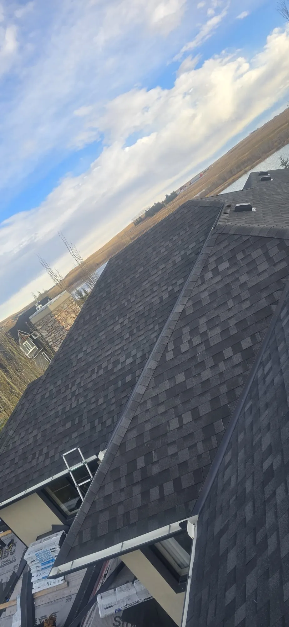 New black asphalt shingle roof hail restoration