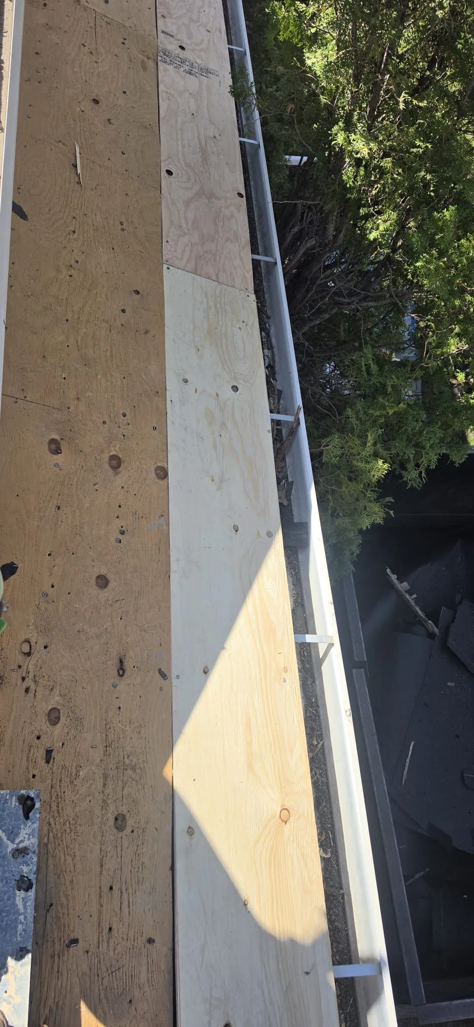 New roof decking plywood installation gutter