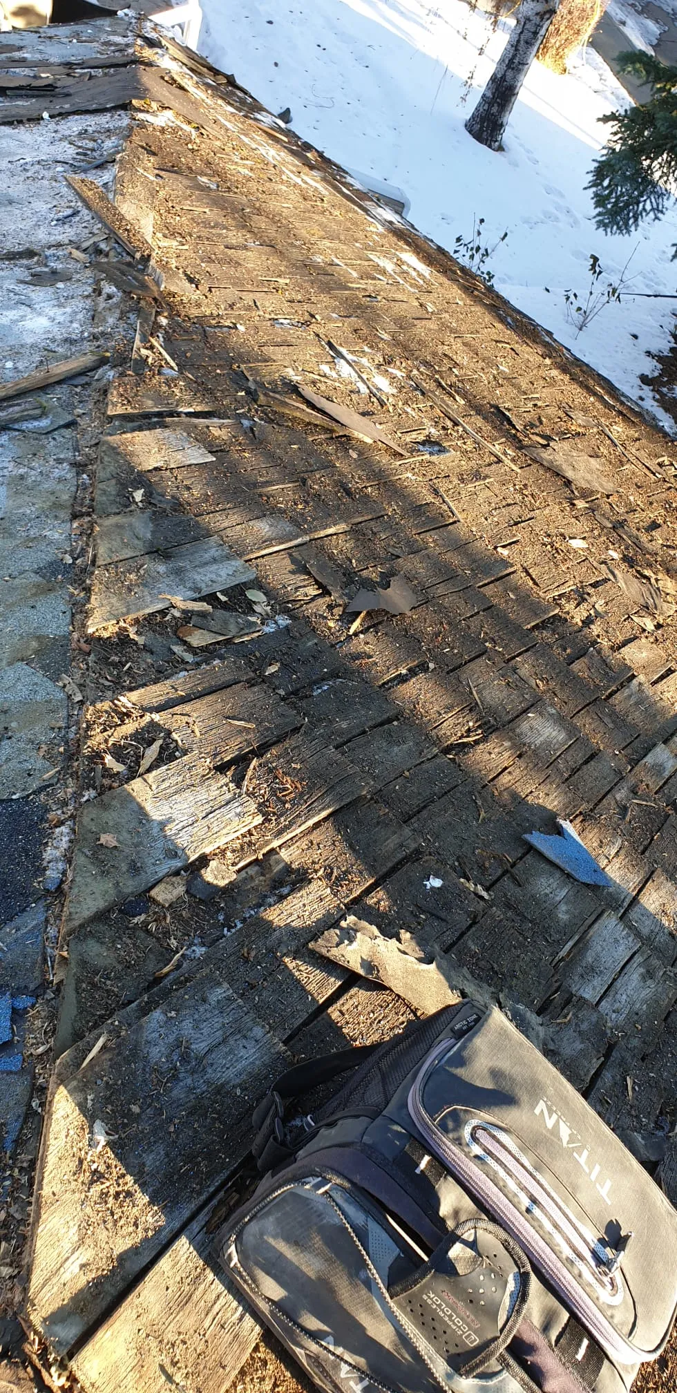 Rotted wood shake roof inspection deterioration